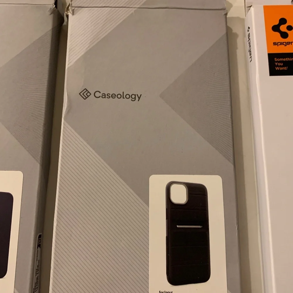 9 Assorted Spigen & Caseology iPhone 14 Plus and iPhone 15 Plus